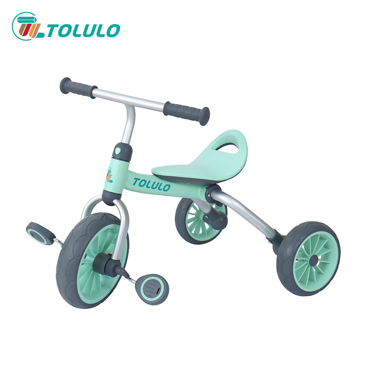 What safety features should one look for when selecting a baby tricycle?